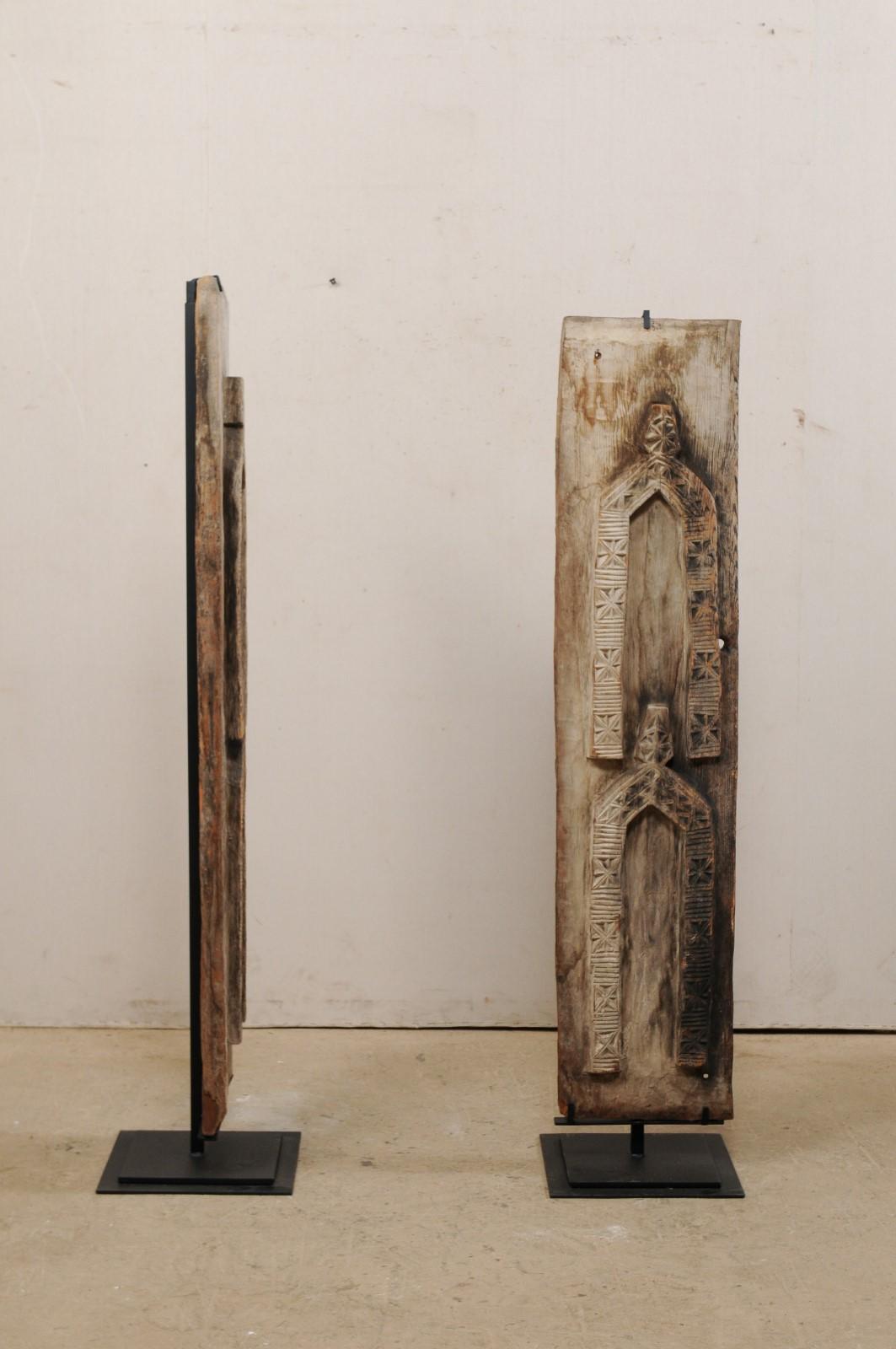 Pair of West African Carved-Wood Panels Raised on Custom Stands 2