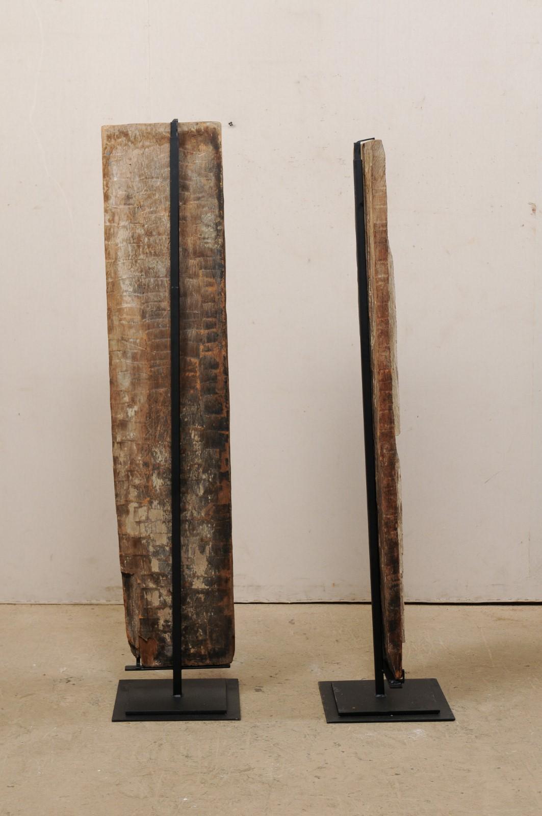 Pair of West African Carved-Wood Panels Raised on Custom Stands 3