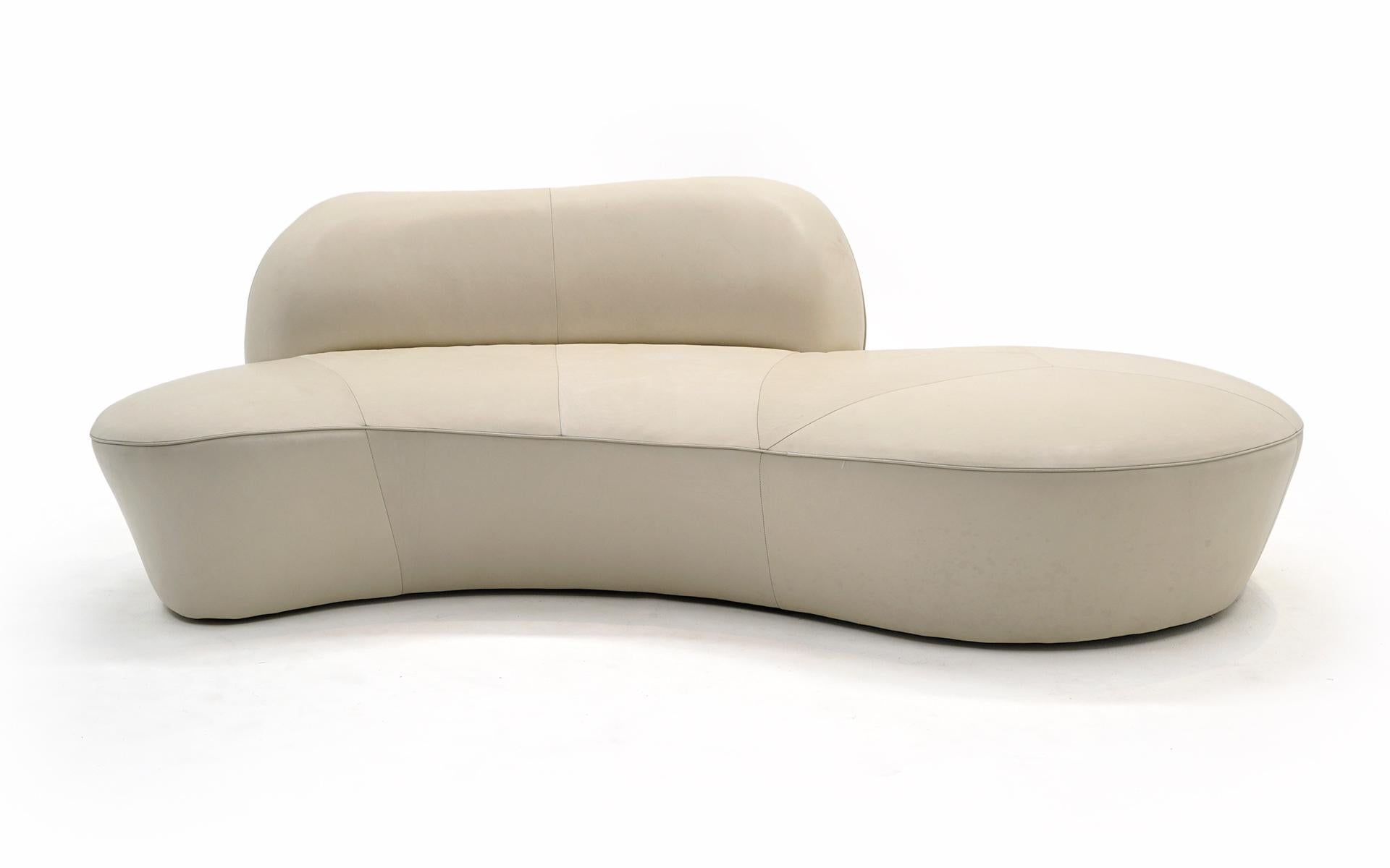 Set of two, mirror image, Ivory leather Zoe cloud sofas designed by Vladimir Kagan for American Leather. These were manufactured in 2009 and have had very little use. We have tried to make any blemishes obvious in the photos. There are no tears,