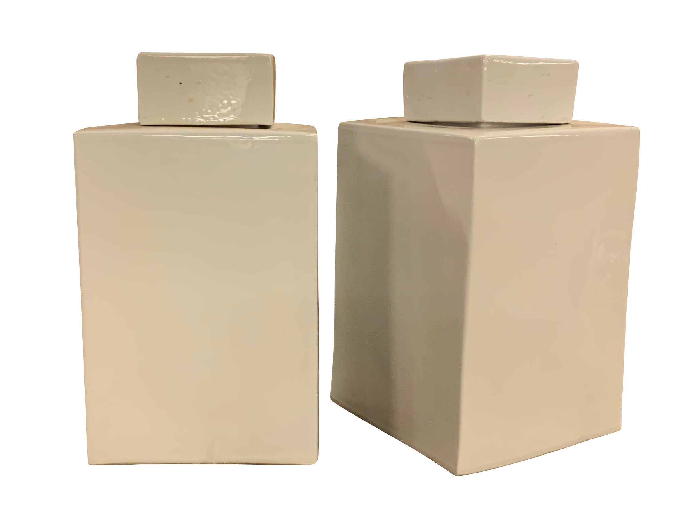 Contemporary Chinese pair of square white glazed cannisters
Square top.
 