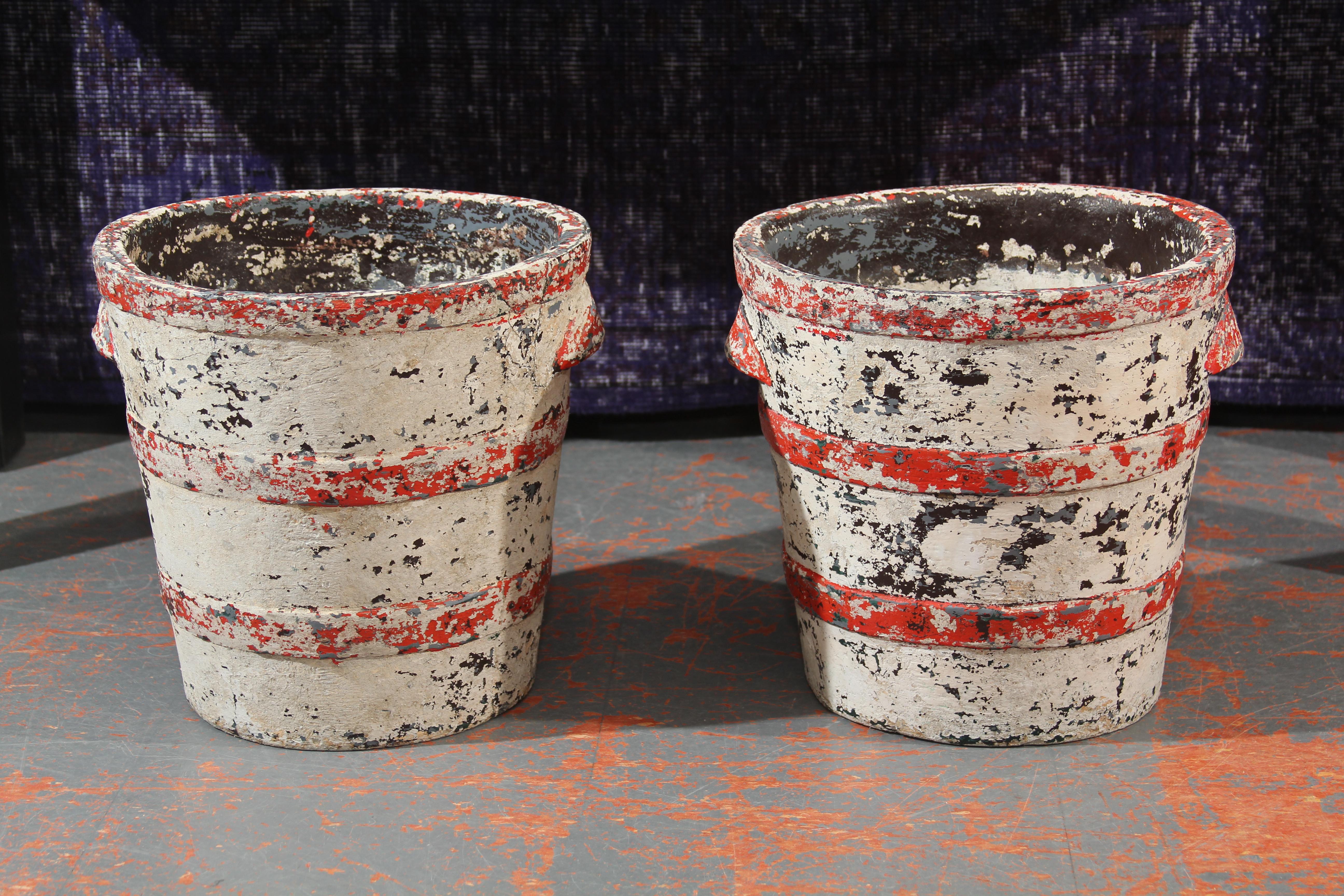 Pair of fiber cement planters by Swiss architect willy guhl. Banded pail shape with two molded handles on each planter. Unusual form and wonderful patina and color. Perfect for indoors or out.