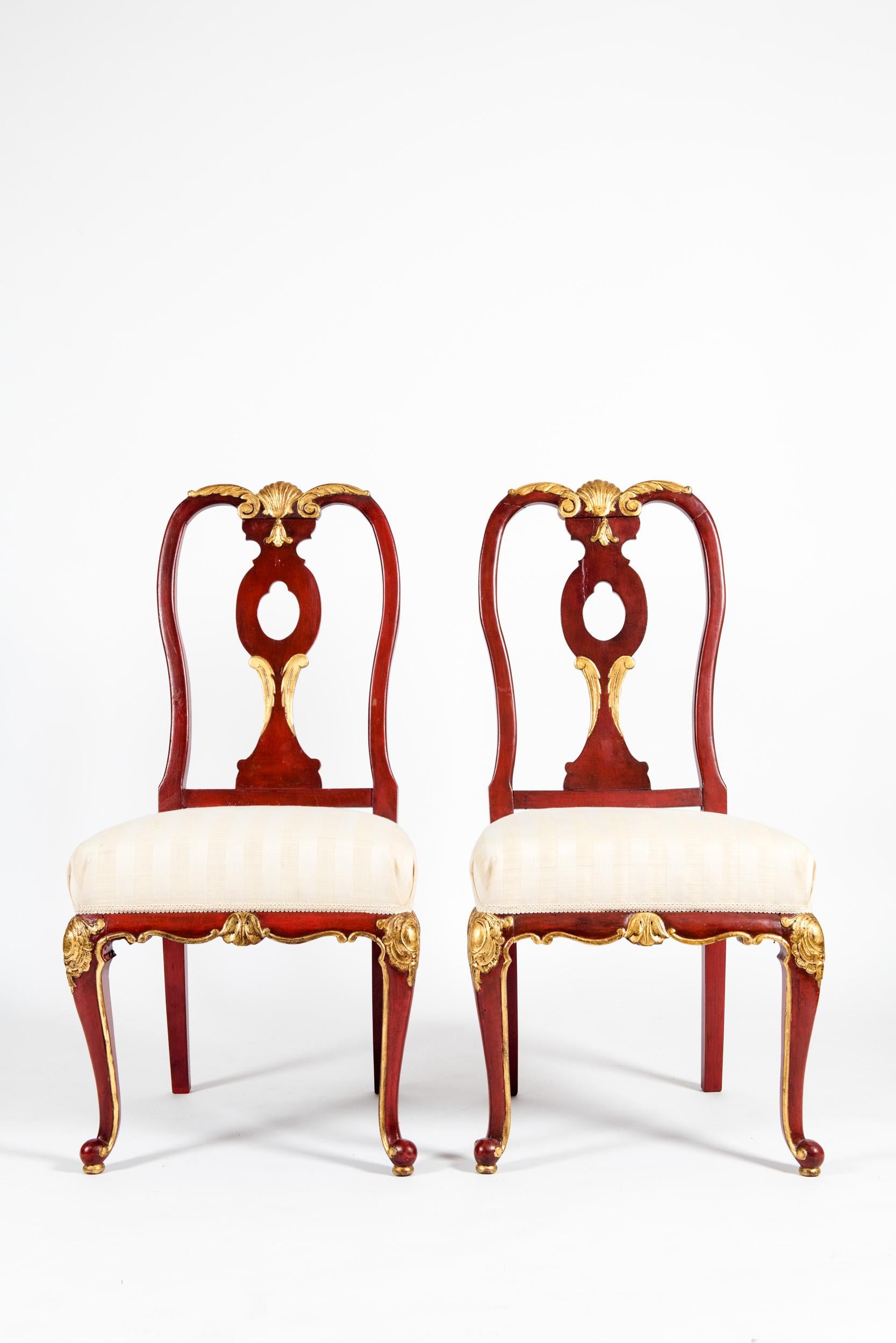 Pair wood framed with gilt design details continental side chairs. Each chairs is in great vintage condition. Minor wear consistent with age or use. Each chair measure about 39 inches high x 18.5 wide x 16 inches deep, seat high 17 inches.