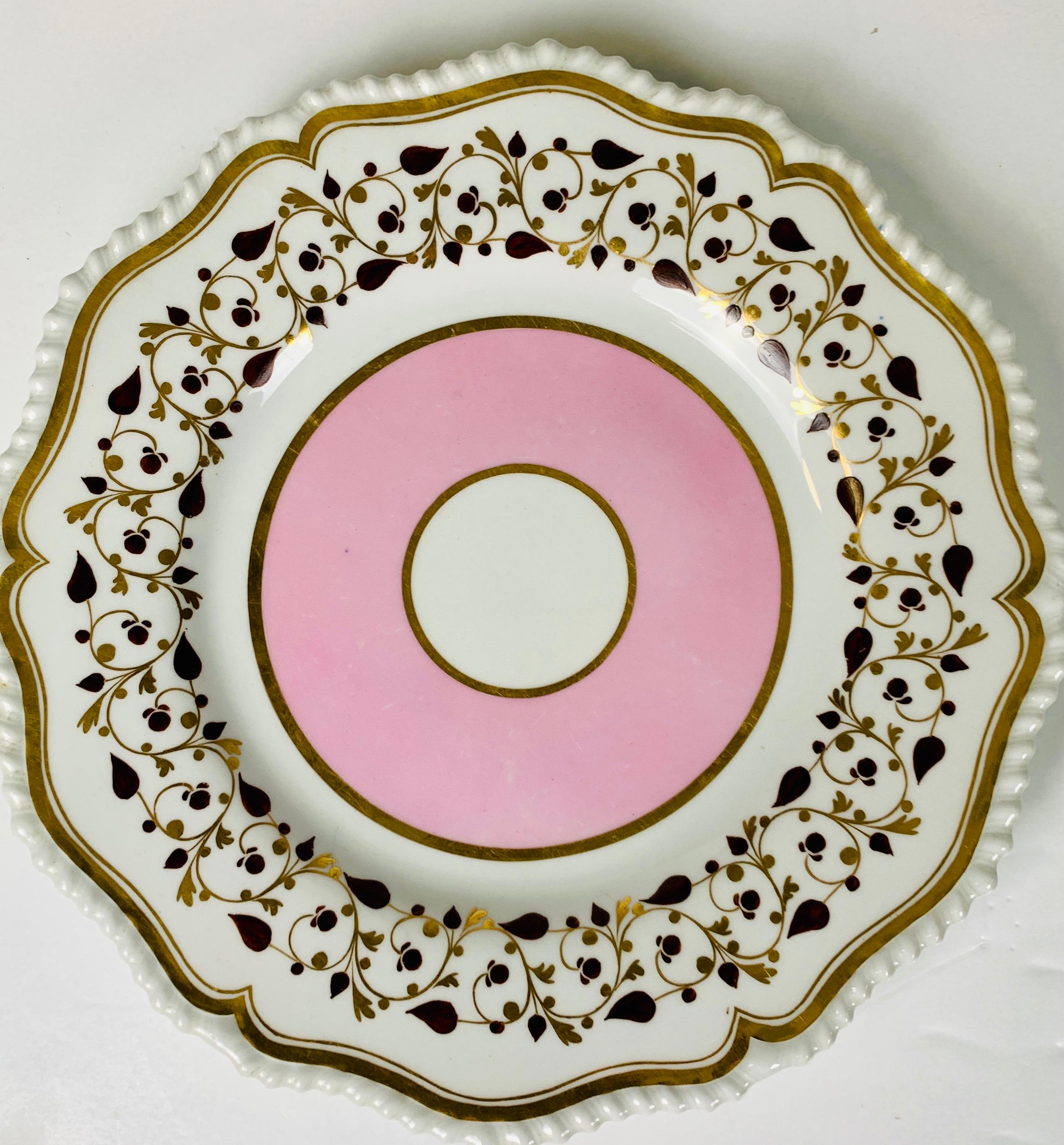 The sweetness of the beautiful pink band is tempered by the brown leaves and berries and the gilded vines surrounding it.
The bright white porcelain allows the pink enamels and the gilding to stand out.
Flight Barr Barr Worcester made these fine