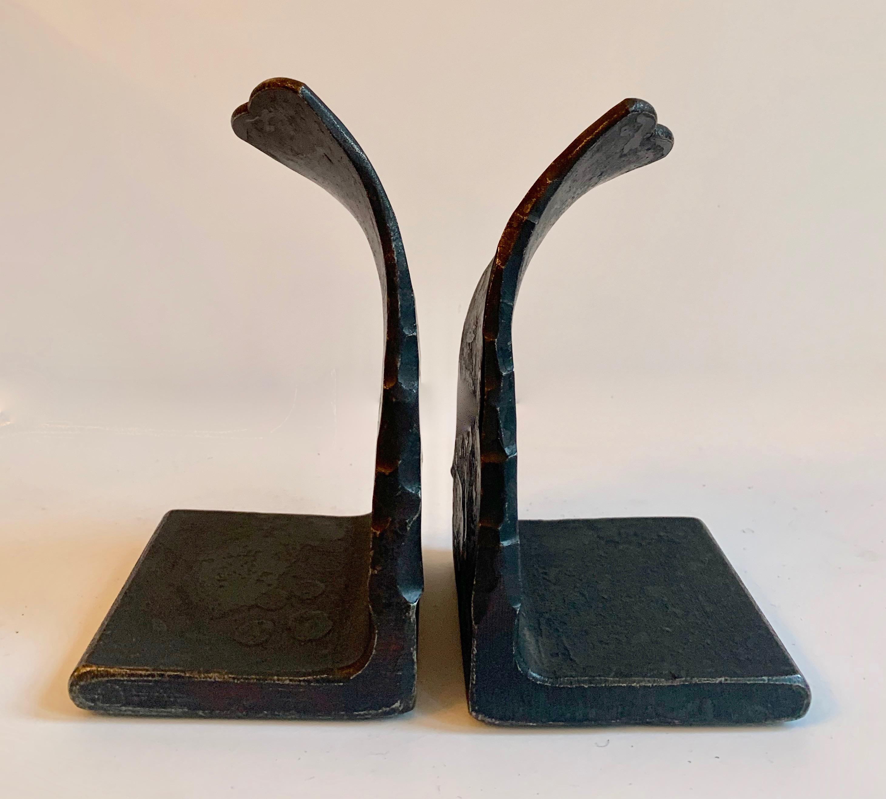 Pair of wrought iron bookends, a wonderful pair with a slight twist to the iron at the top.