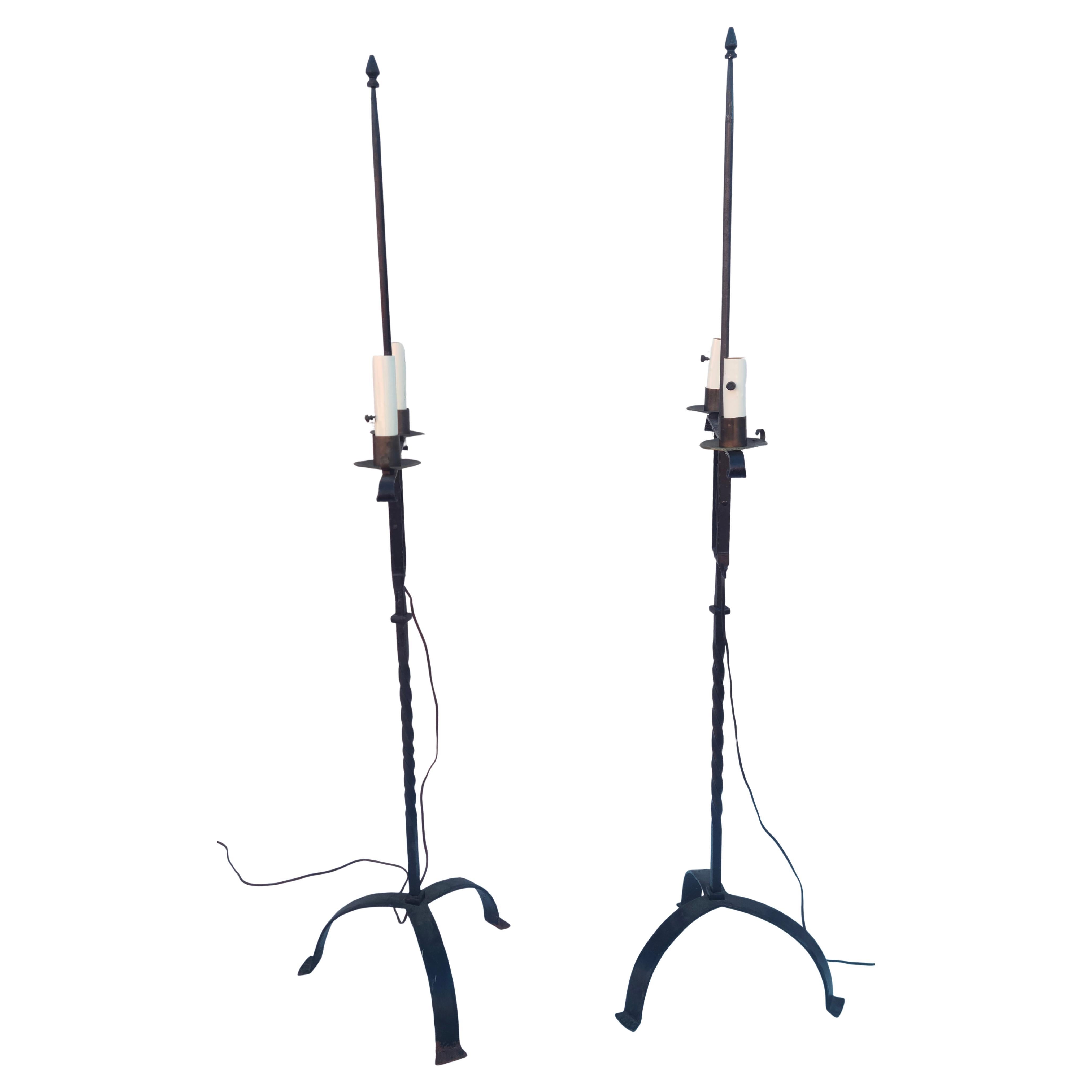 Please feel free to reach out for efficient shipping to your location.

Pair Revival Wrought Iron Floor Lamps.

In the style of 18th Century Candle Holders.

Probably made around 1930.