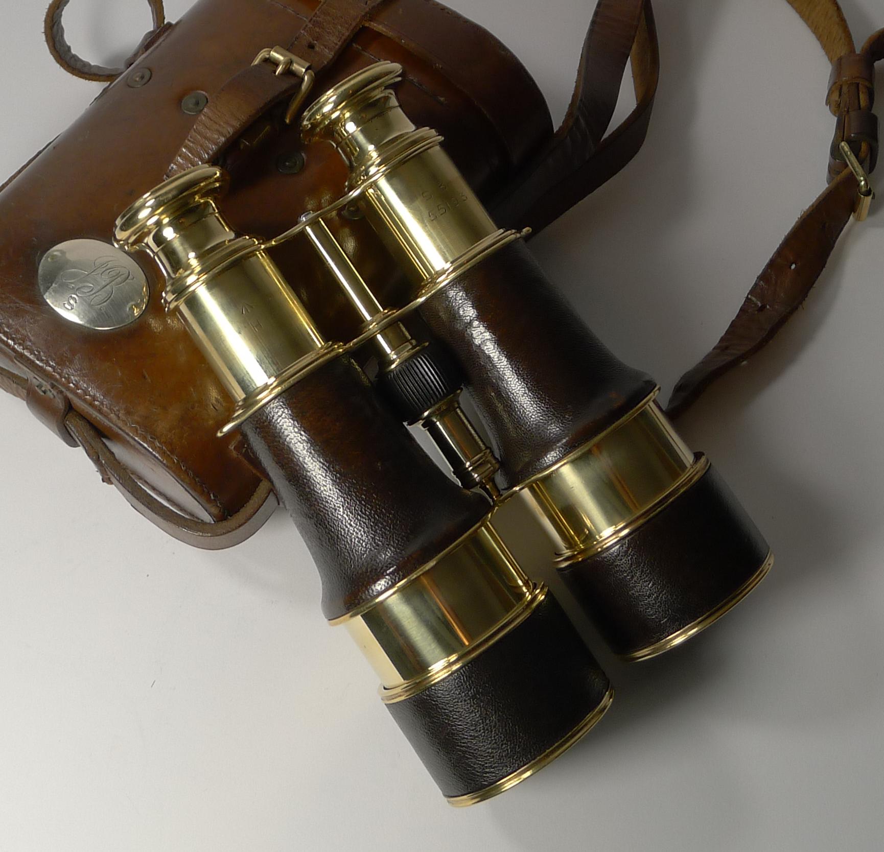 A fabulous pair of French made World War 1 British Officers Military binoculars with the brass on the binoculars with the British military crows foot mark. They were manufactured by the creme de la creme of makers and signed on both eyepieces,