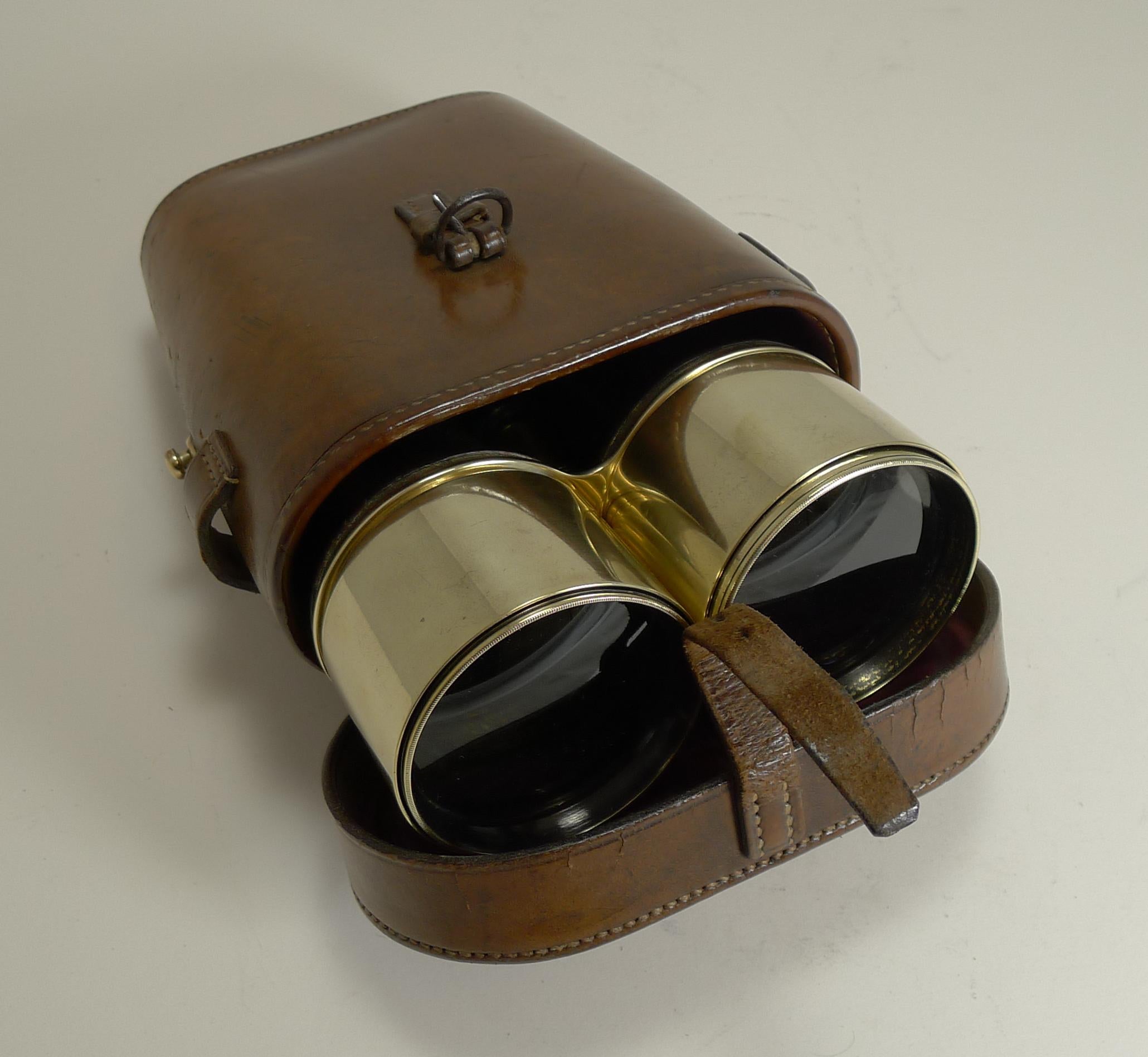 A handsome pair of British issued First World War leather and polished brass binoculars together with the original leather case.

Made by the well renowned maker Ross of London, both eye pieces are signed and the interior of the lid is also signed
