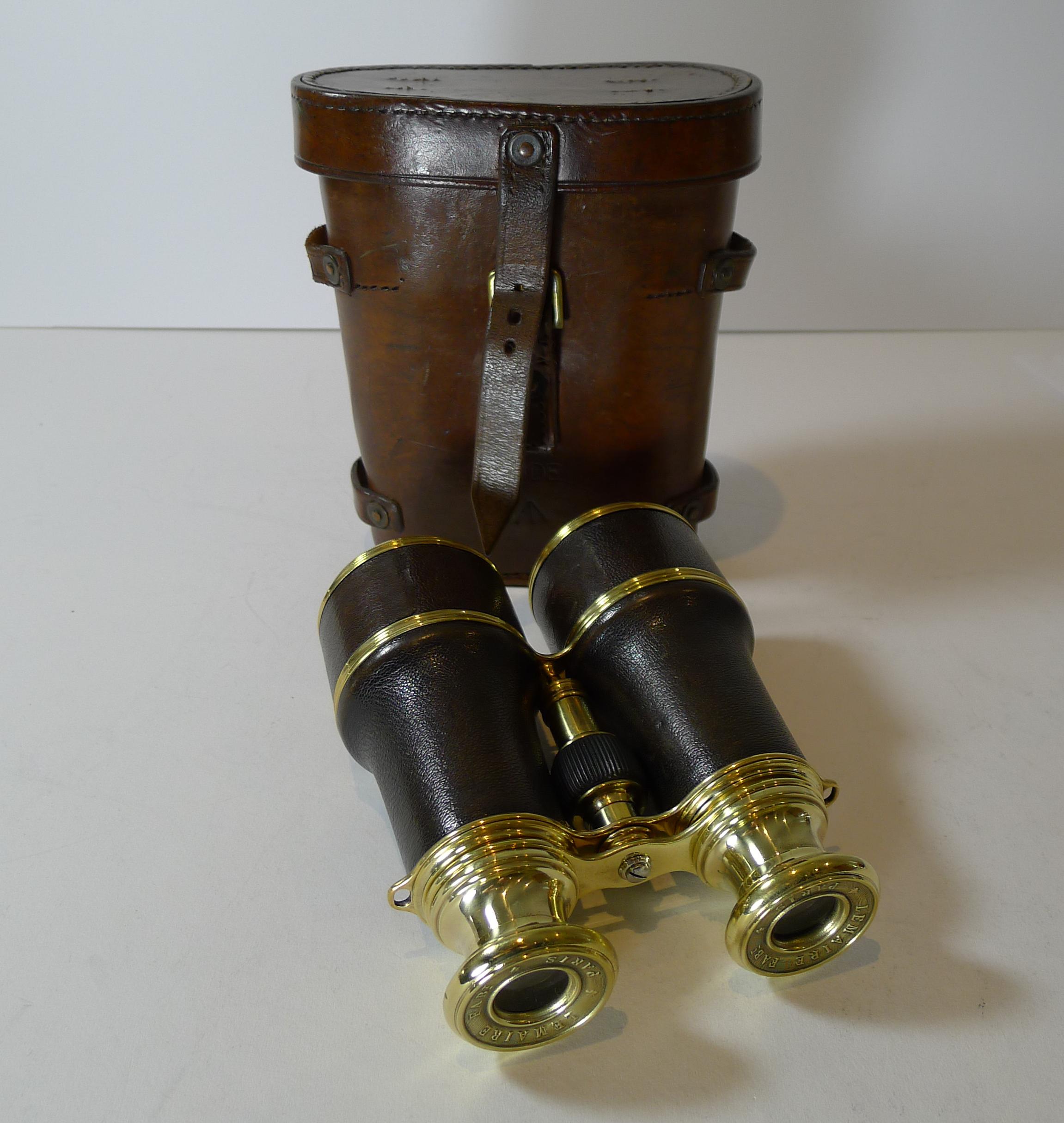 A fabulous pair of French made World War 1 British Officers Military binoculars with both the brass on the binoculars and the leather case with the British military crows foot mark. They were manufactured by the creme de la creme of makers and