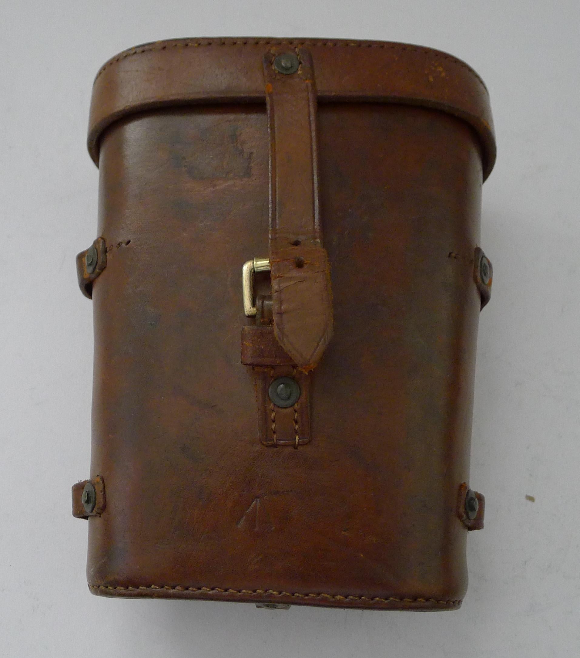 A fabulous pair of French made World War 1 British Officers Military binoculars with both the brass on the binoculars and the leather case with the British military crows foot mark. They were manufactured by the creme de la creme of makers and