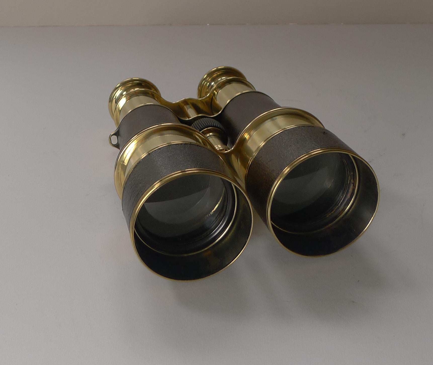 A fabulous pair of French made World War 1 British Officers Military binoculars with the brass on the binoculars stamped with the British military crows foot mark. They were manufactured by the creme de la creme of makers and signed on both