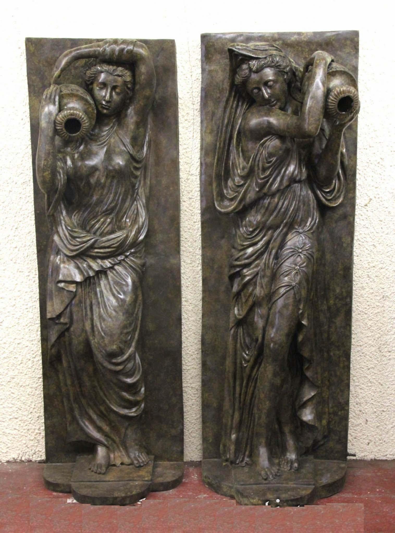 Gorgeous pair of large Italian bronze toga clad maiden wall fountains
Great for standing against a wall
There  is a water intet at the back and the water spouts from the classical urn when connectted to a water supply
Note if you would like to view