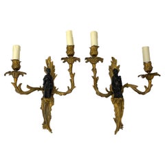 Paire d'appliques en bronze de style Louis XV décor aux chinois