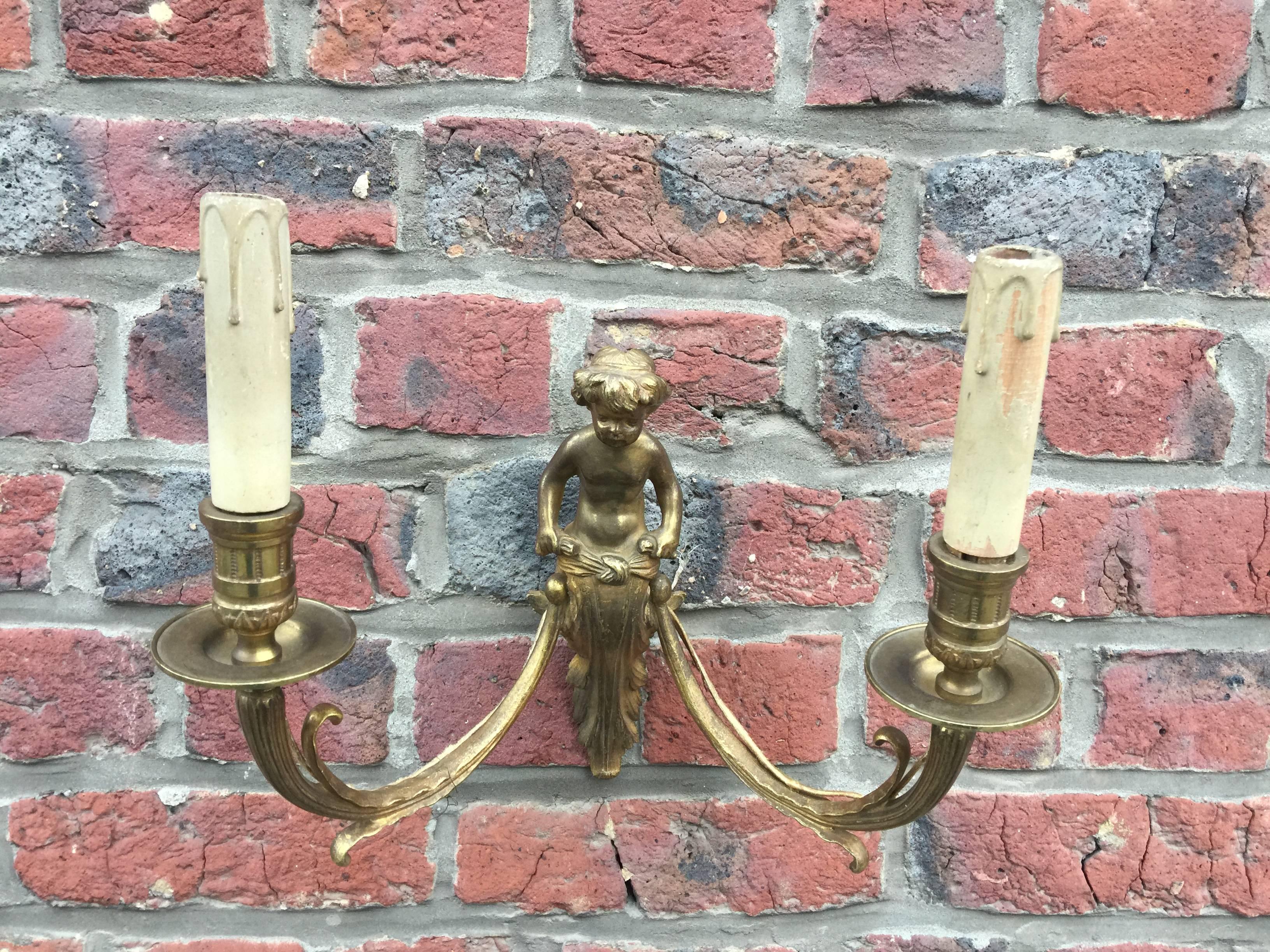 French Pair of Louis XVI style bronze sconces circa 1930. For Sale