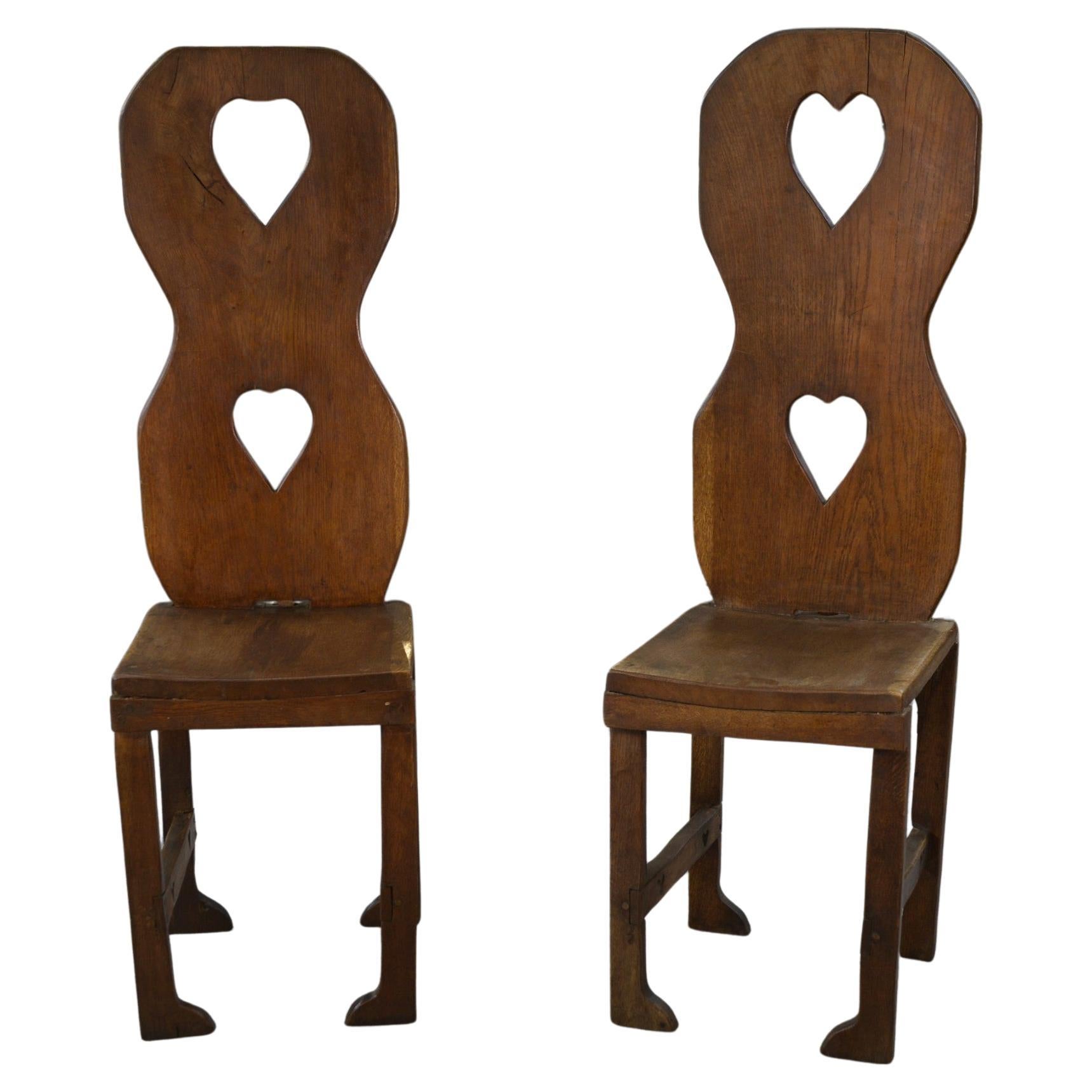 Par de chaises Art Populaire en chêne massif France fin XIXème en venta