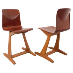 Coppia di chaises design vintage ASS Schulmöbel Pagholz Thur-Op-Seat en bois cour