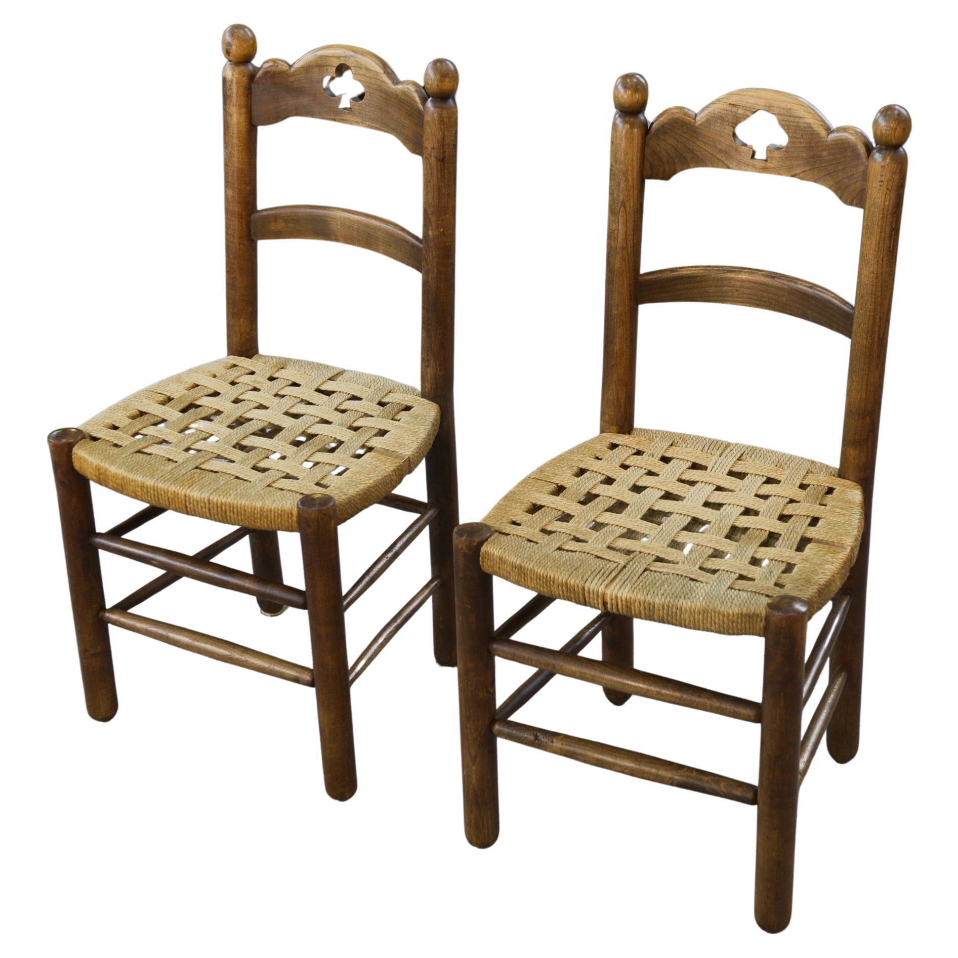 Par de chaises en hêtre et assises en cordage dans le goût de Charles Dudouyt en venta