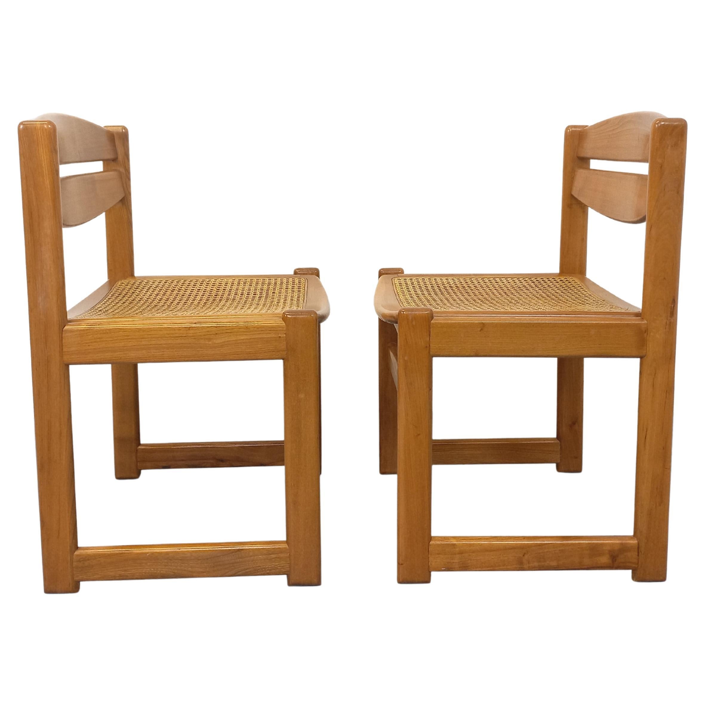 Paire de chaises traîneau vintage en bois de hêtre et cannage des années 70 80