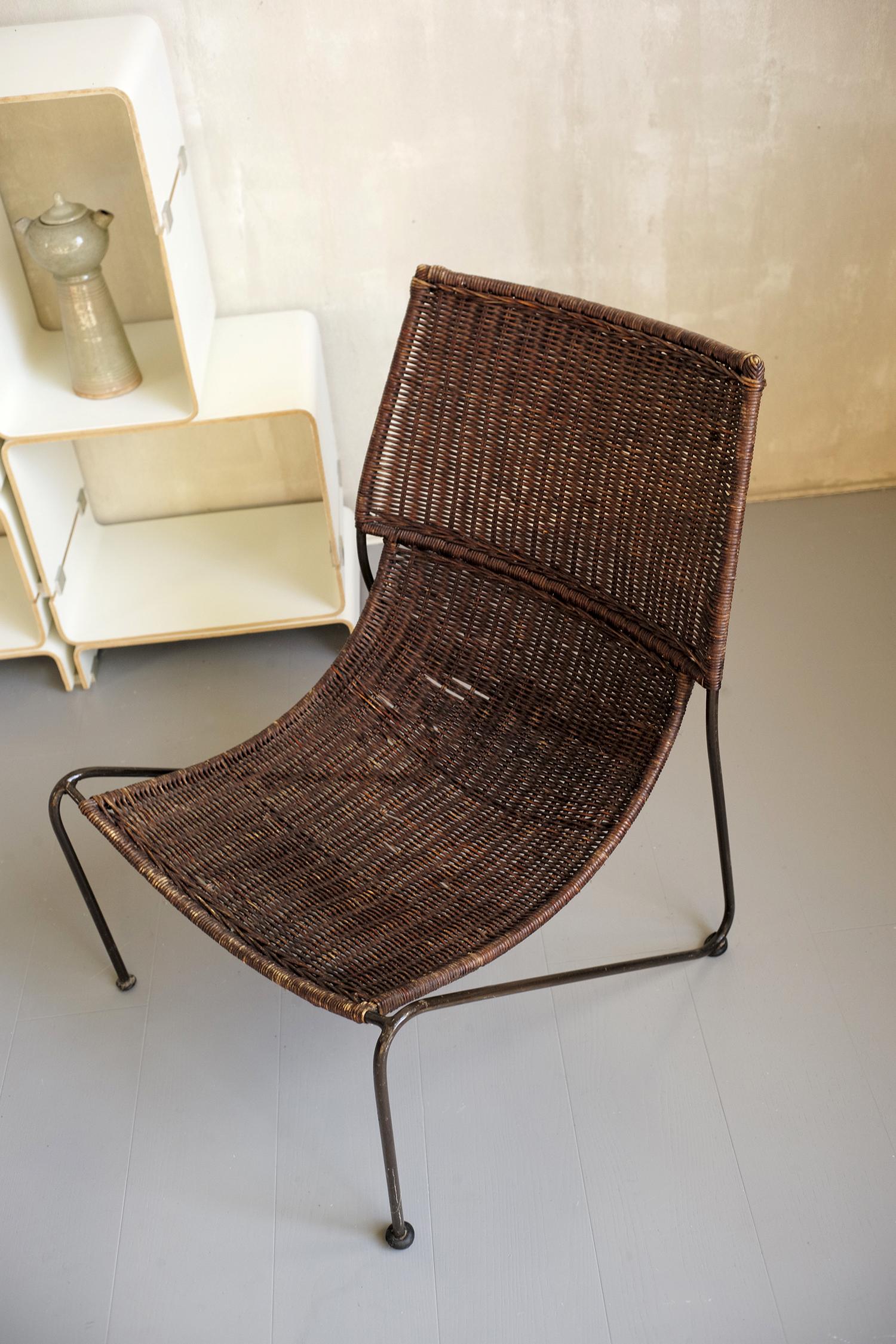 Pair of rattan fireside chairs, 1950 1