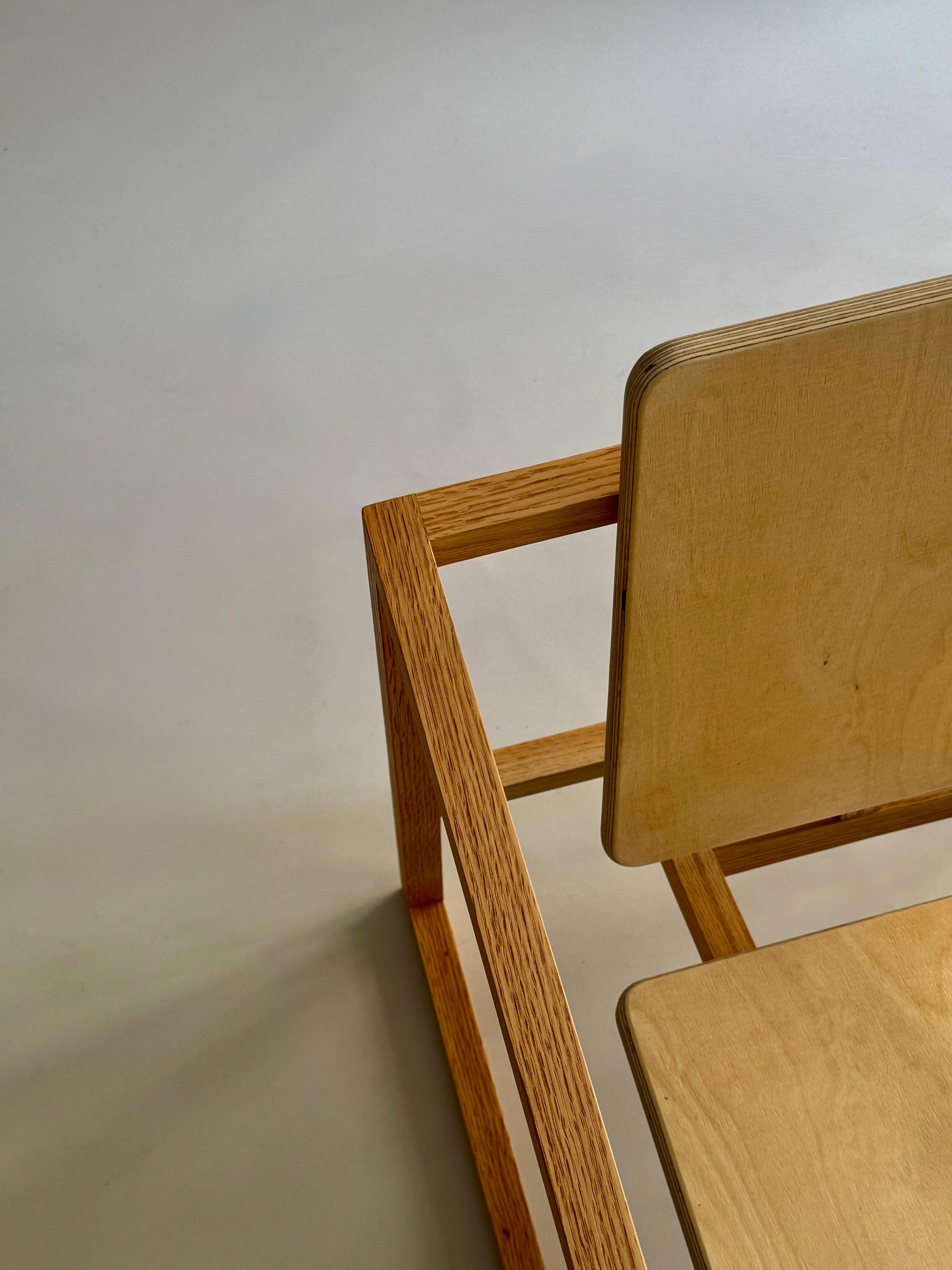 Paire de fauteuils en bois cubique Hecho a mano en venta