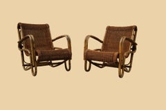 Vintage Rattan Armchairs, French Design, Comfortable Seating, 1950s