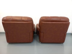 Paire de fauteuils lounge vintage en skai des années 60 70