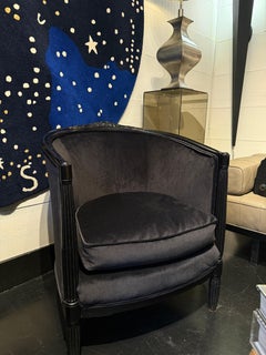 Paire de fauteuils noirs velour et bois sculpté Léon Jallot