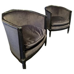 Paire de fauteuils noirs velour et bois sculpté Léon Jallot