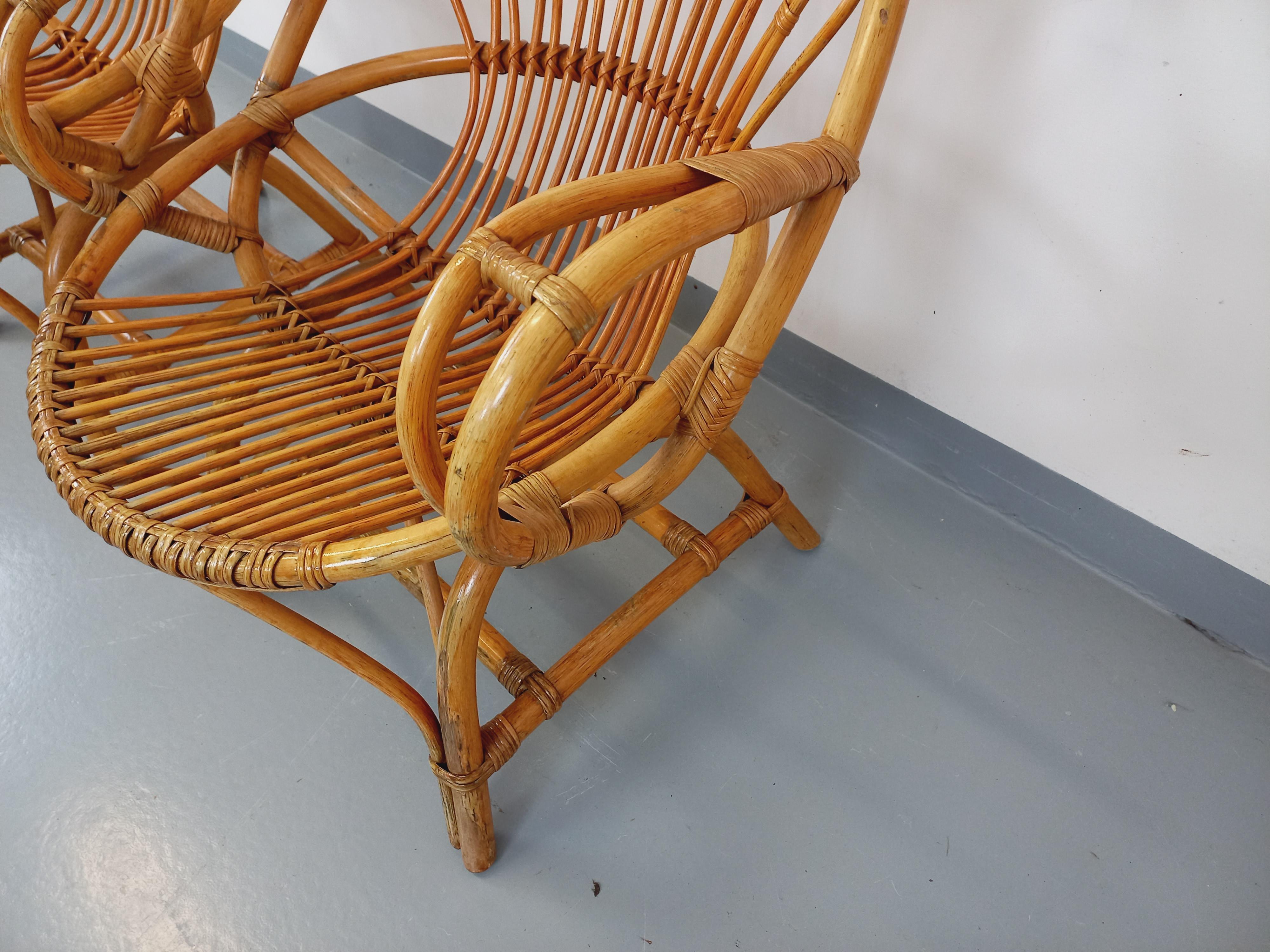Paire de fauteuils vintage en rotin des années 60 en venta 5