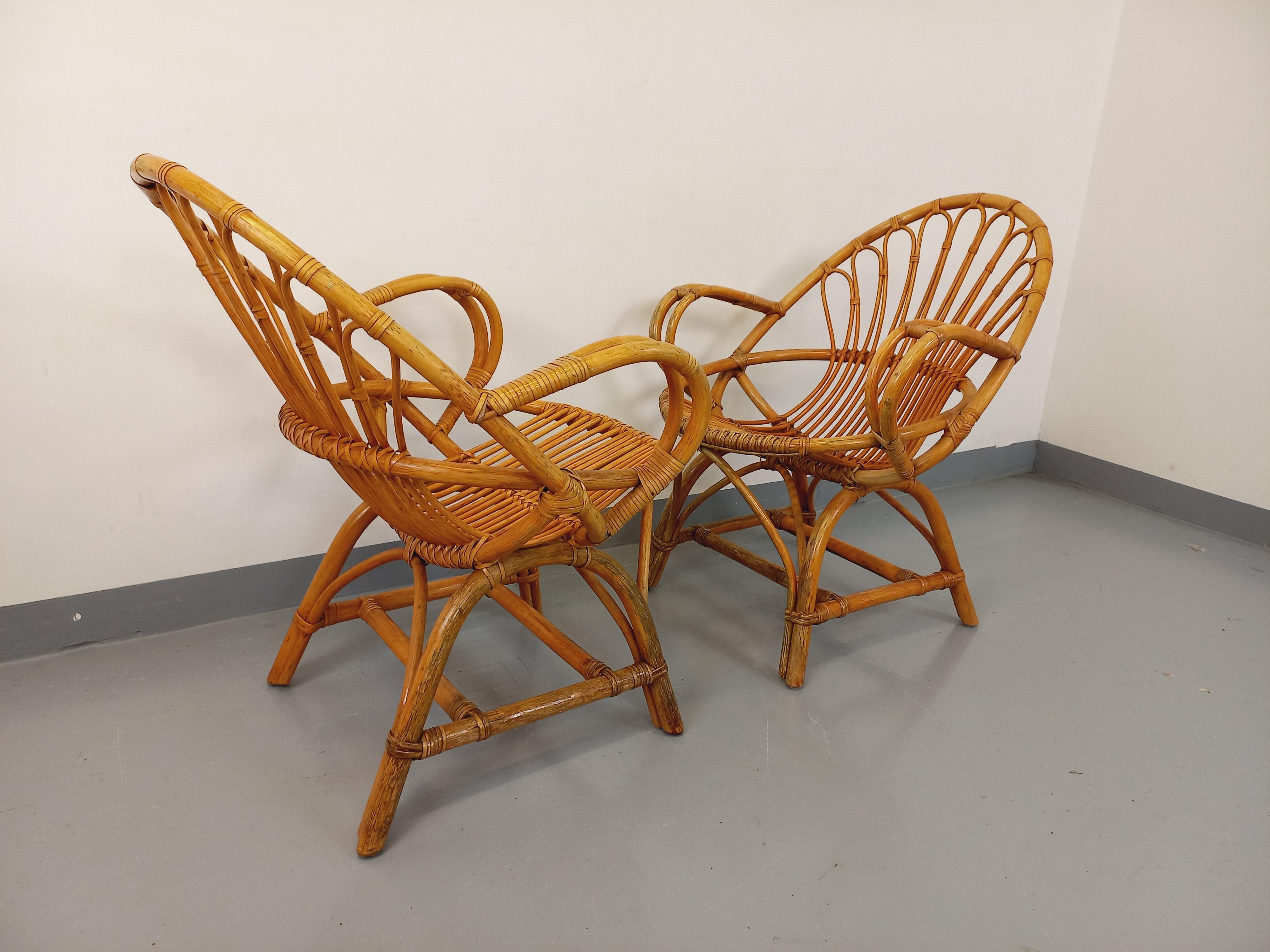 Paire de fauteuils vintage en rotin des années 60 en venta 8