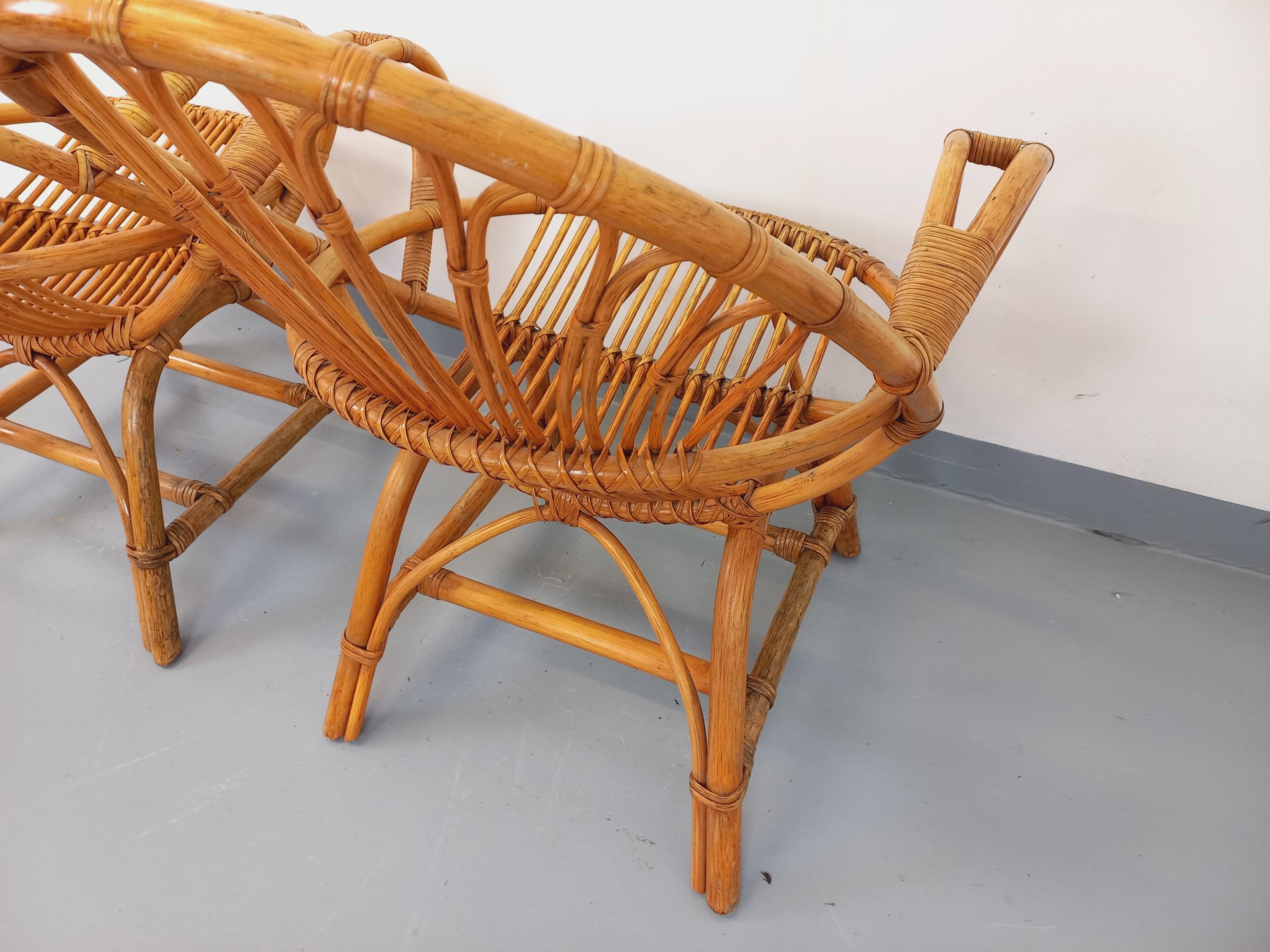 Paire de fauteuils vintage en rotin des années 60 en venta 11