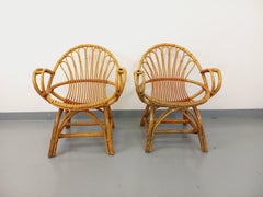 Paire de fauteuils vintage en rotin des années 60