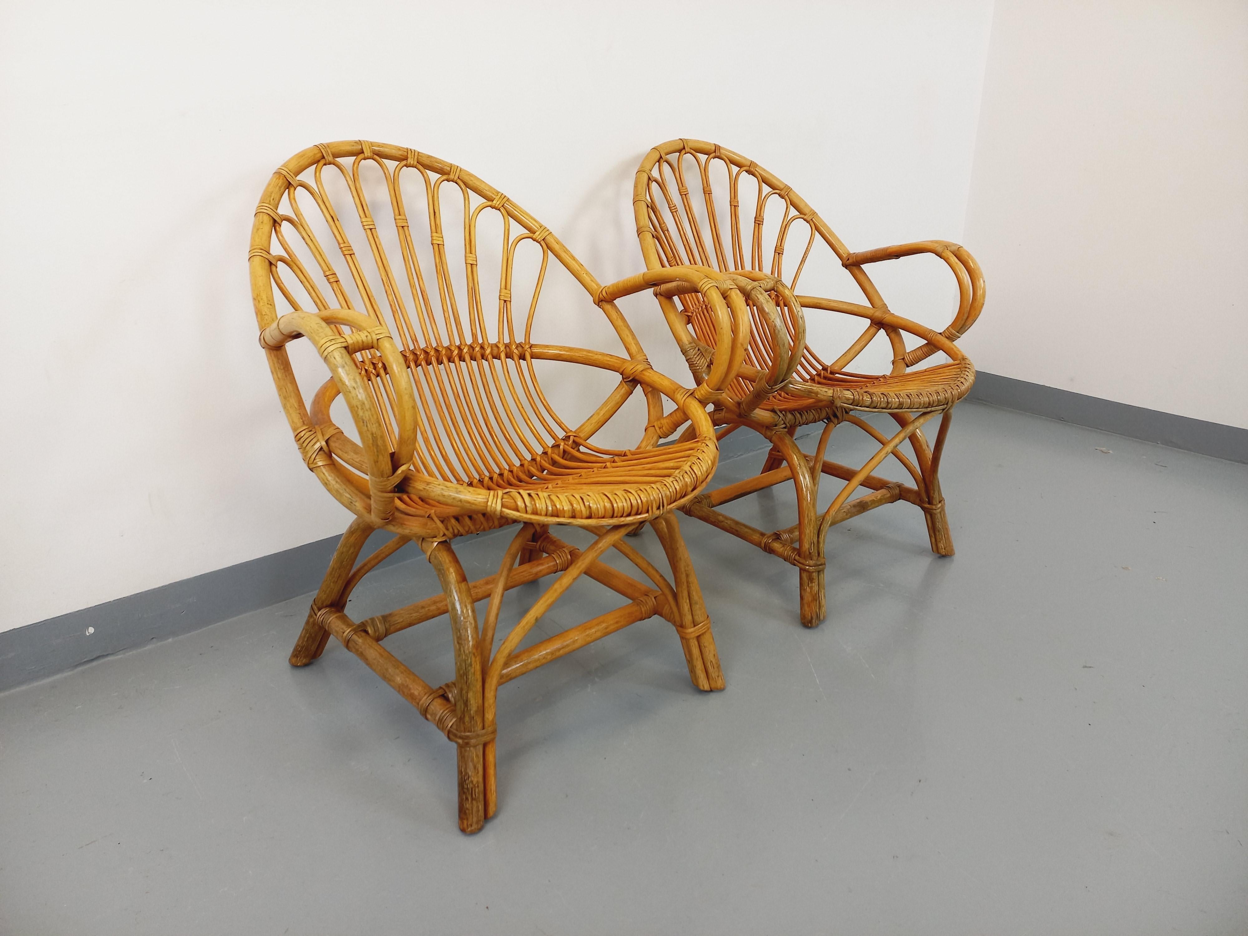 Paire de fauteuils vintage en rotin des années 60 Francés en venta