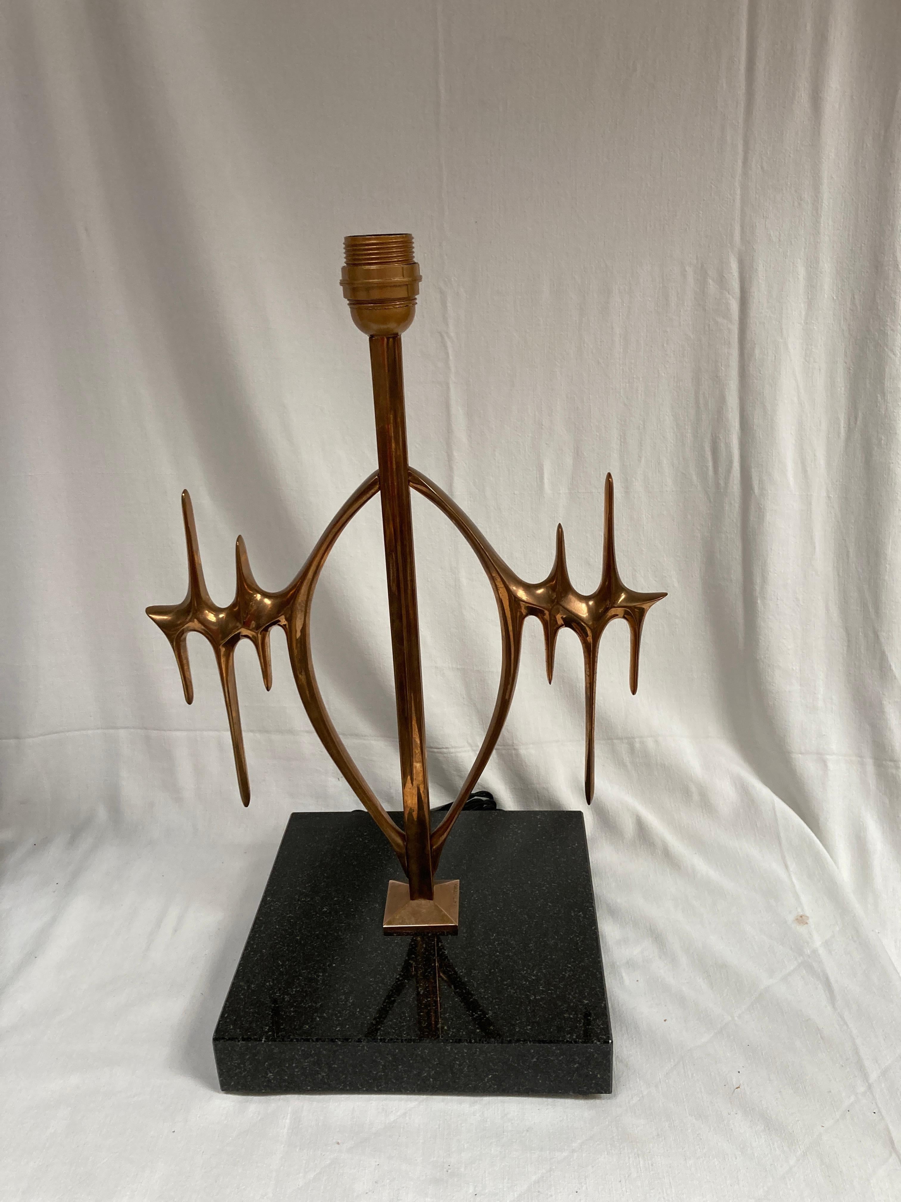 Pair of sculptural bronze lamps by Peter Van Heeck
Signed
France
Dimensions given without shade 
No shade included

