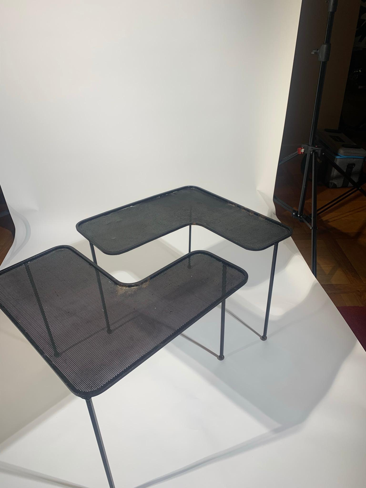 Pair of black perforated sheet metal table says Domino by M. Mategot.
