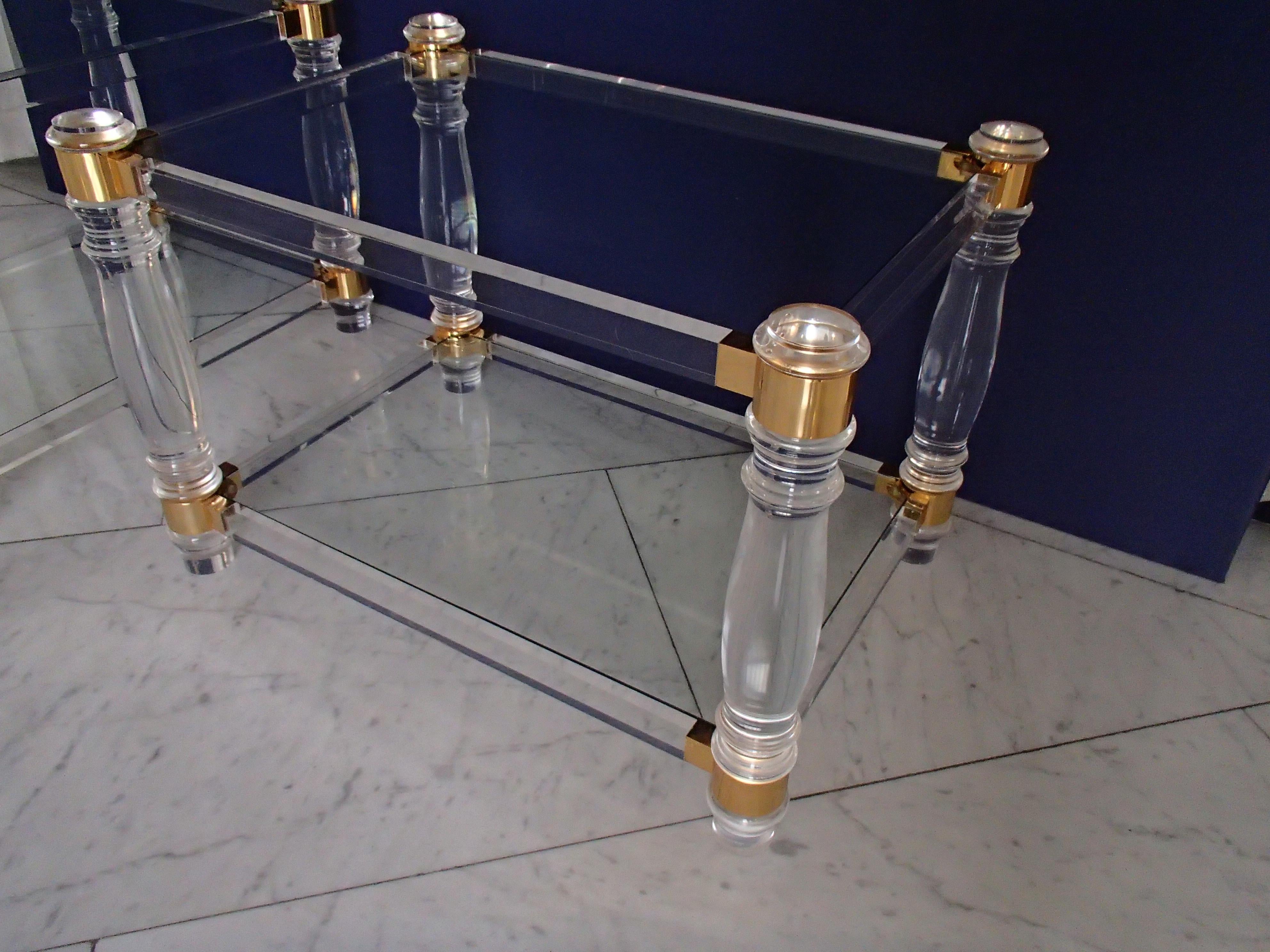Pair of modern side tables plexi glass, glass and brass.

 