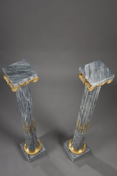 Paire of Fluted marble columns with ionic capitals