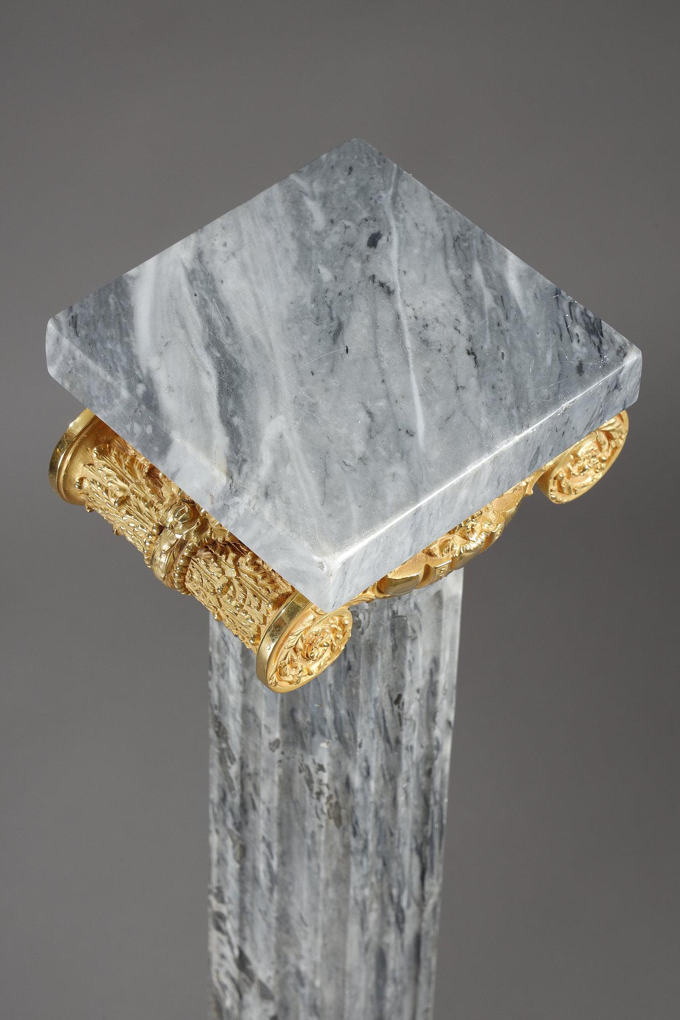 Paire of Fluted marble columns with ionic capitals 2