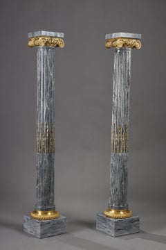 Paire of Fluted marble columns with ionic capitals