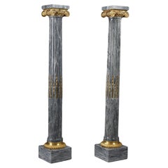 Paire of Fluted marble columns with ionic capitals