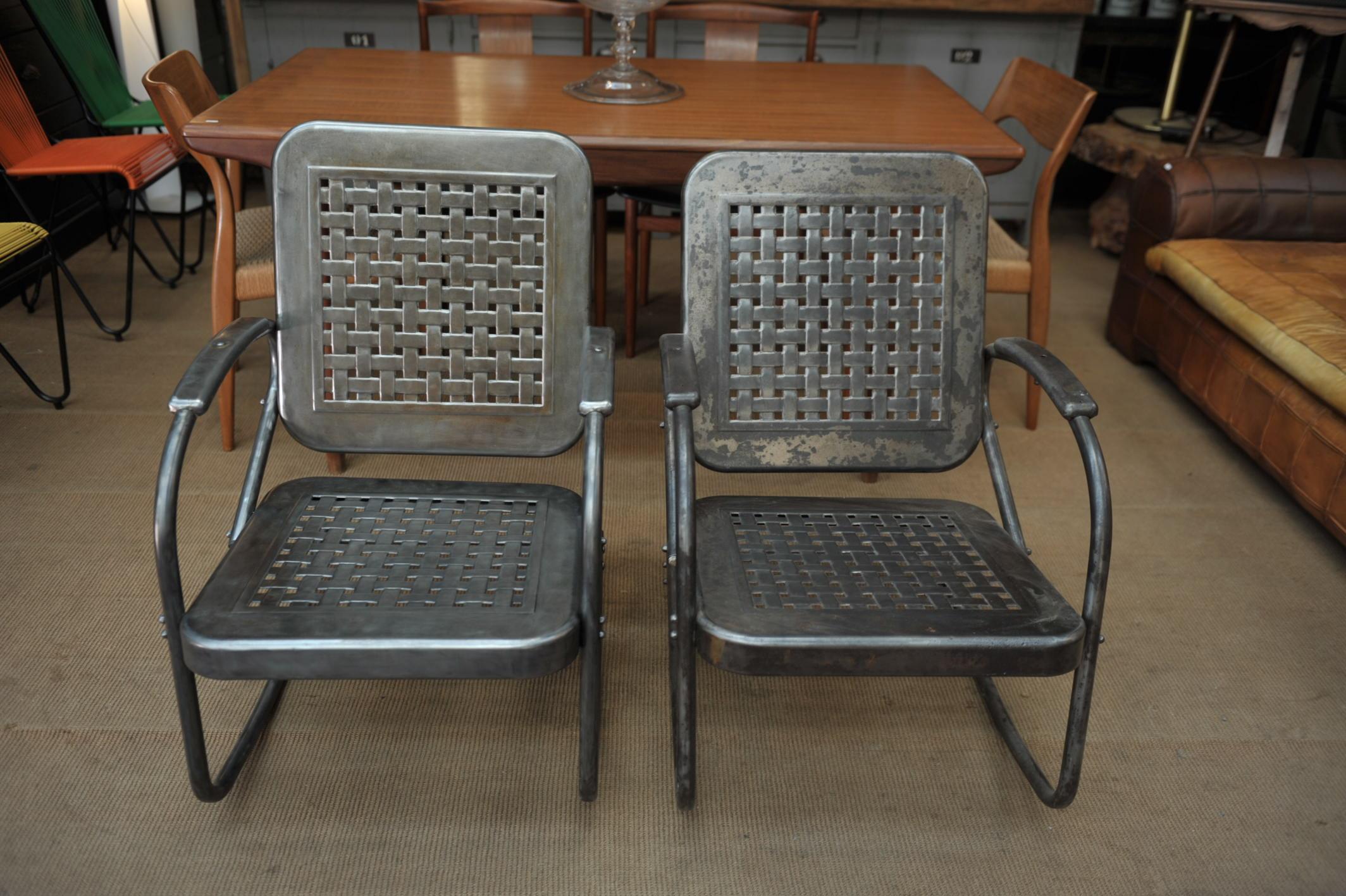 Pair of perforated metal armchairs or Rocking chairs USA, circa 1950. Polished and varnish finish.