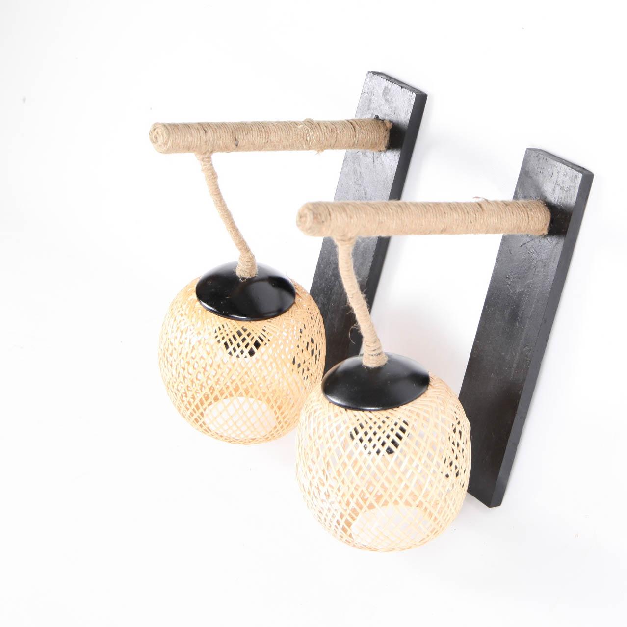 Pair of wooden, bamboo and rope wall lights. In the style of Audoux & Minet.