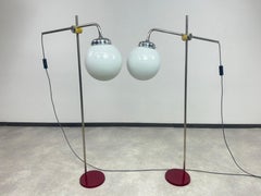 Paired mid-century modern chrome floor lamps
