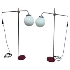 Paired mid-century modern chrome floor lamps