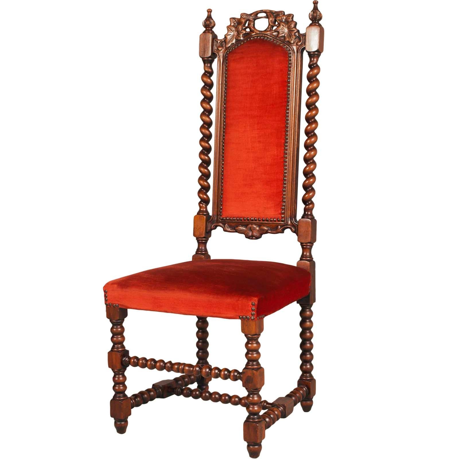 Late 19th century pairs Venetian hall chairs by Atelier Cadorin, in wood of walnut, hand carved.
The two chairs are upholstered with original red velvet fabric. One of the two seats has a slight tear, which does not disfigure the seat, but will be