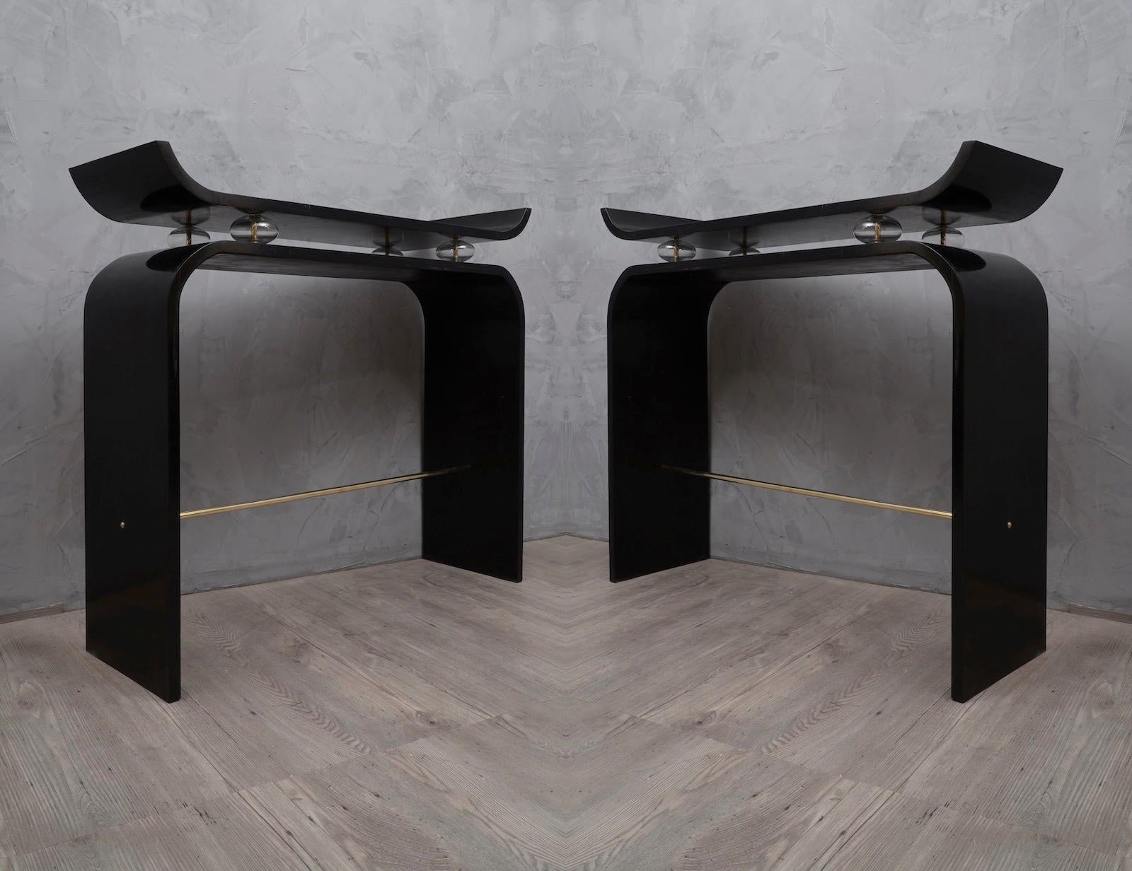 Pair of console tables with captivating shape 