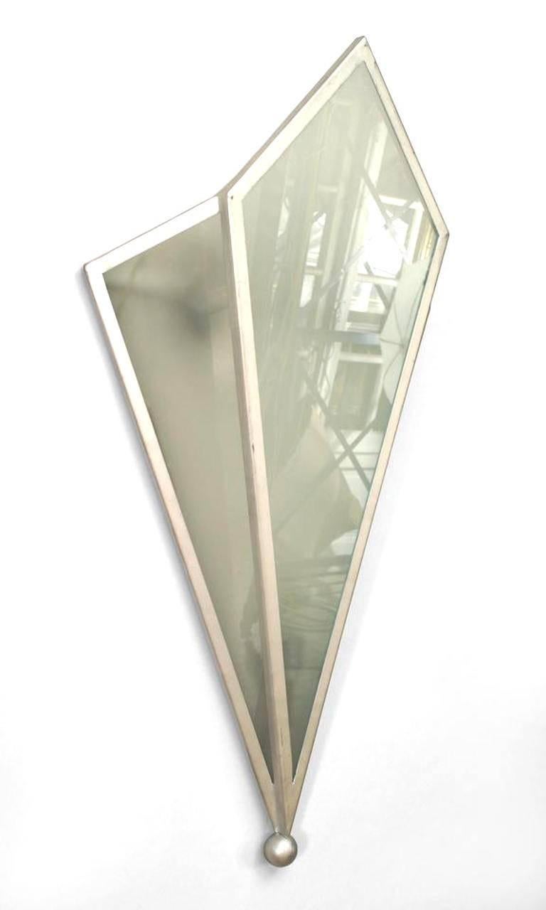 Two pairs of Art Deco style (modern) wall sconces with three geometric shaped frosted glass panels set in a silver painted metal frame (priced per pair).
   