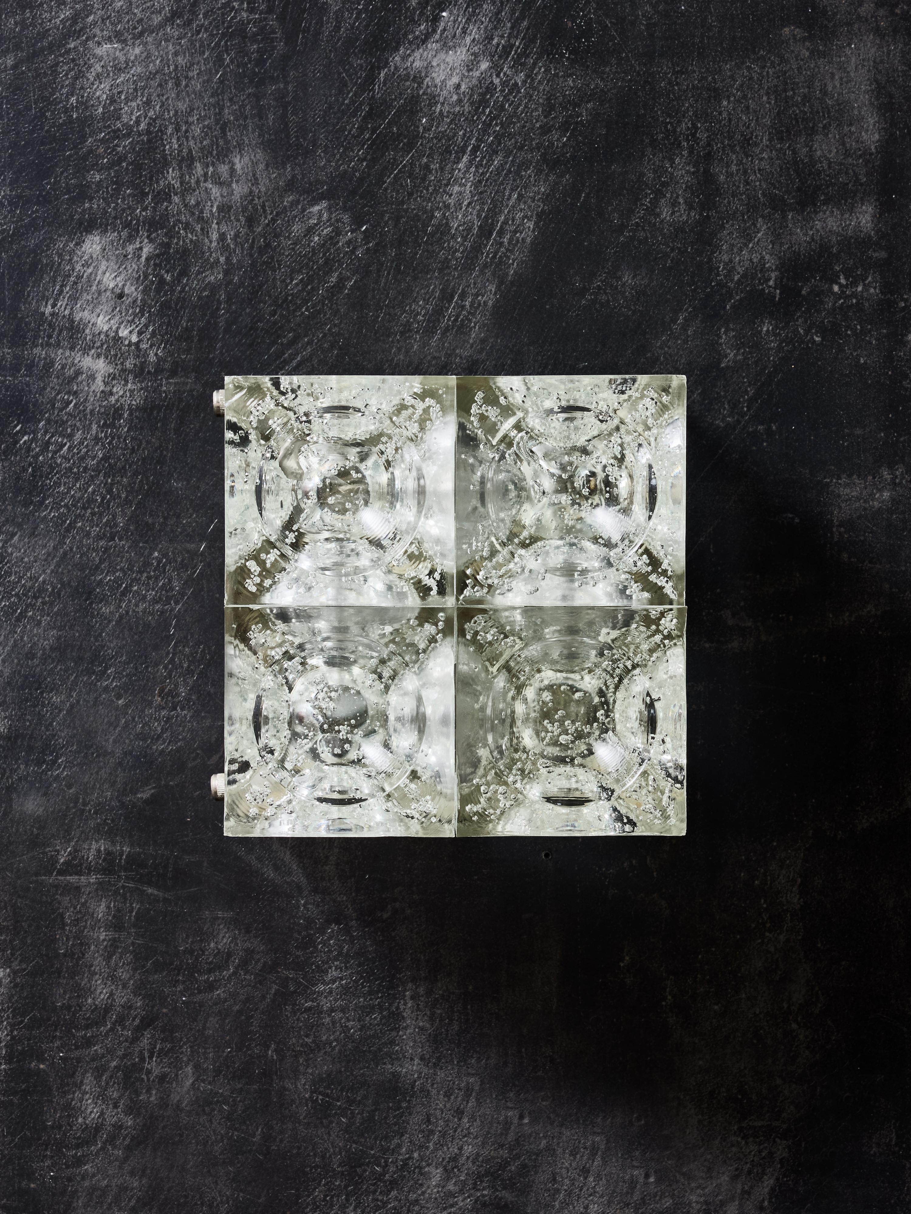 Due coppie di scultoree e rare applique 