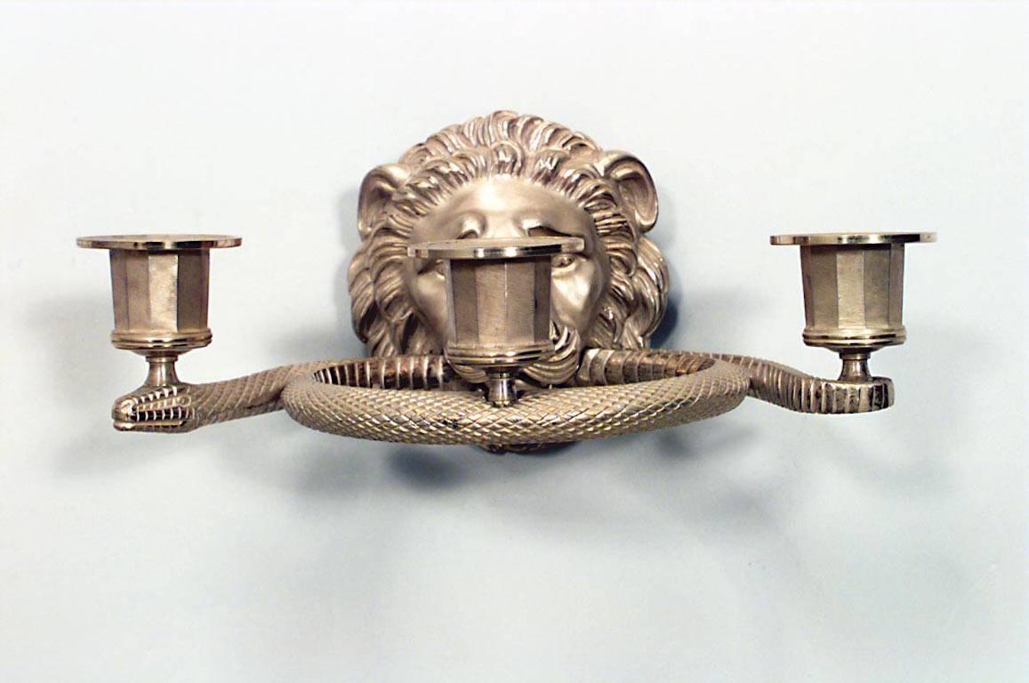 4 English Regency-style (20th Century) gilt metal wall sconces with three arms, lion head ornaments, and snake design. (PRICED EACH)
