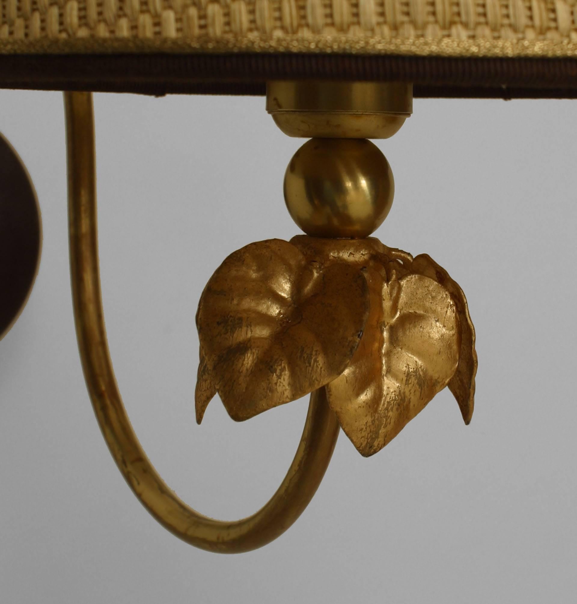 Two pairs of Italian 1940s gilt metal swing arm wall sconces with leaves cups hold a light with a shade (Per pair).
     
   