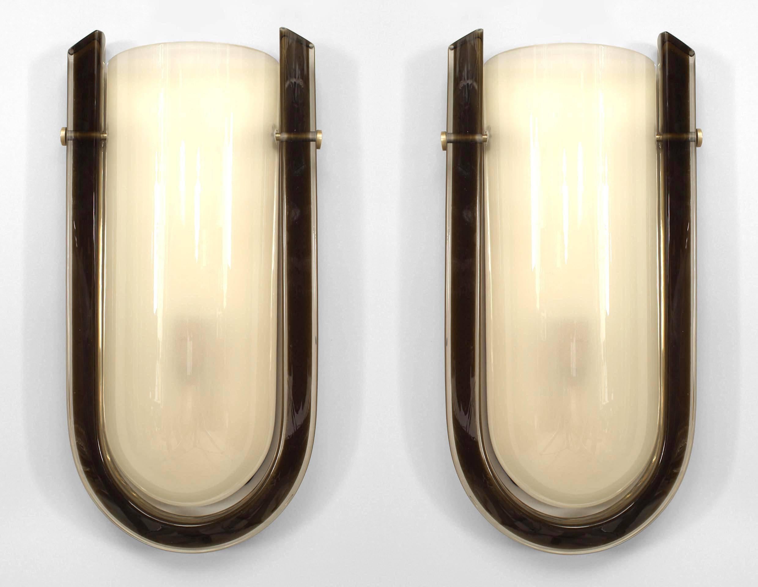 Pair of Italian Murano glass wall sconce with oval form frosted white shade within a 